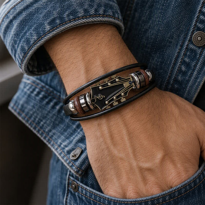 Bracciale in lega con testa di chitarra elettrica e cinturino in pelle - image 1