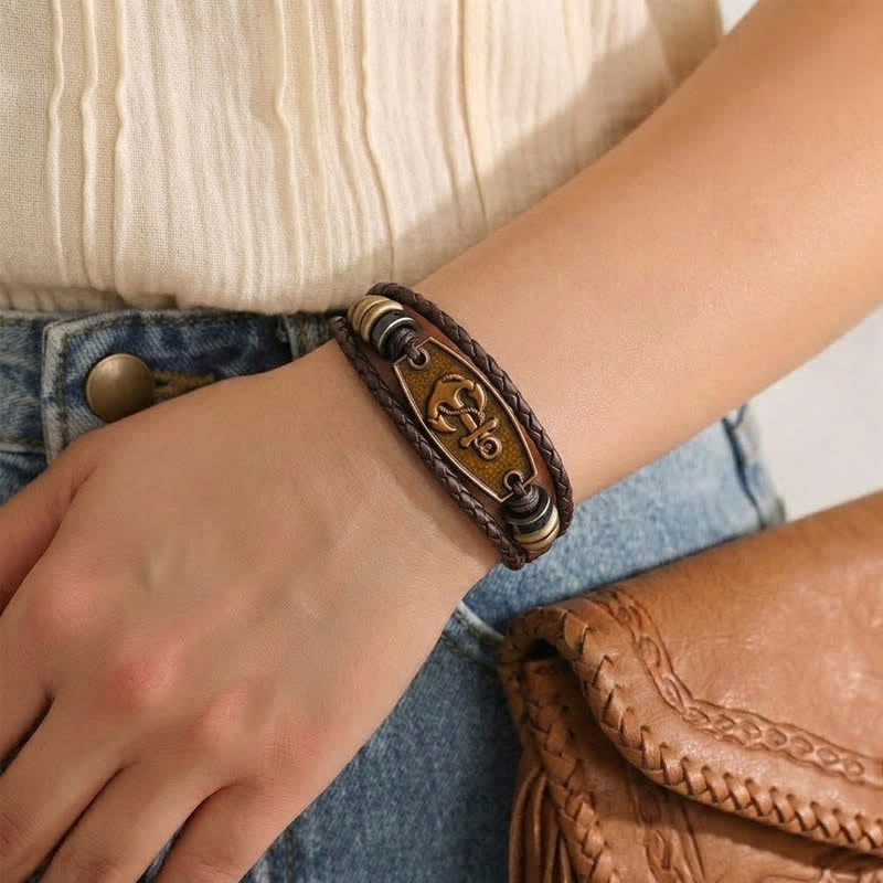Bracciale vintage in bronzo antico con intreccio multistrato in pelle. - image 1