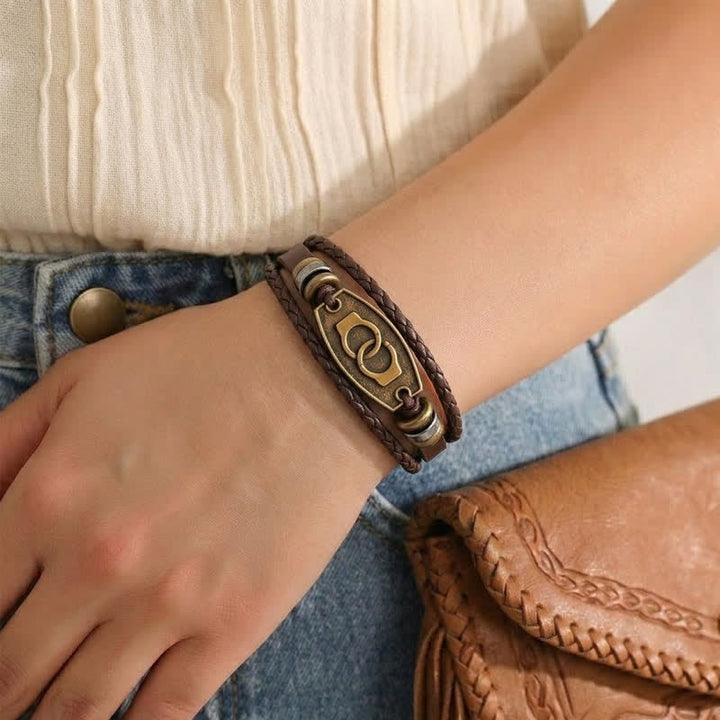 Bracciale vintage in bronzo antico con intreccio multistrato in pelle. - image 5