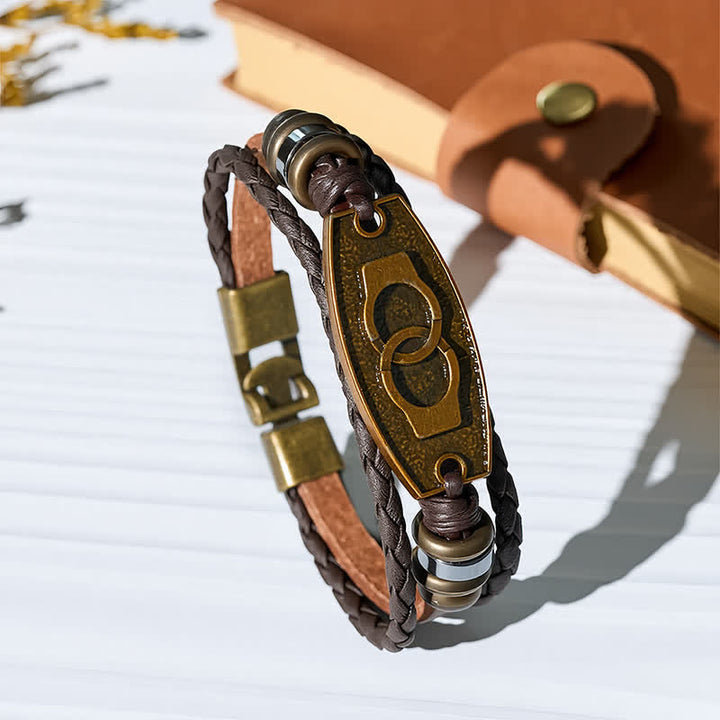 Bracciale vintage in bronzo antico con intreccio multistrato in pelle. - Manette - image 3