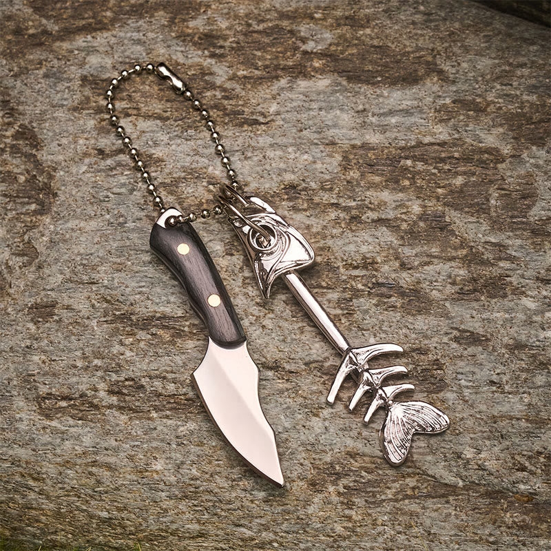 Portachiavi con coltello multiuso staccabile a forma di lisca di pesce e mini pesce. - image 2