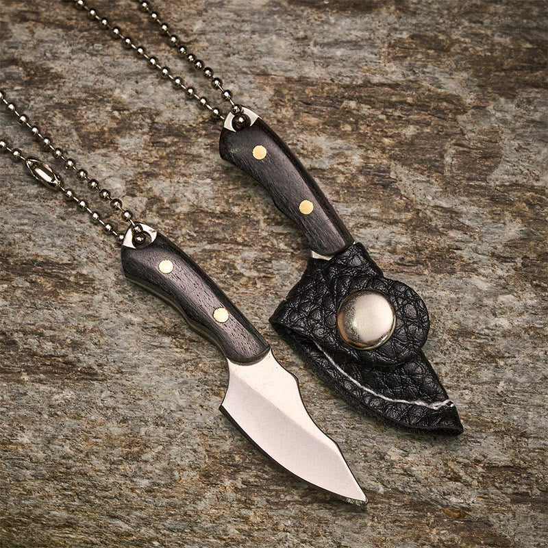 Portachiavi con coltello multiuso staccabile a forma di lisca di pesce e mini pesce. - image 3