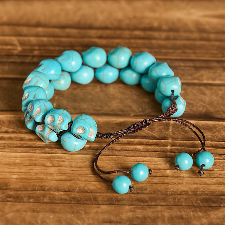 Bracciale intrecciato regolabile con teschio gotico turchese e perline - image 3