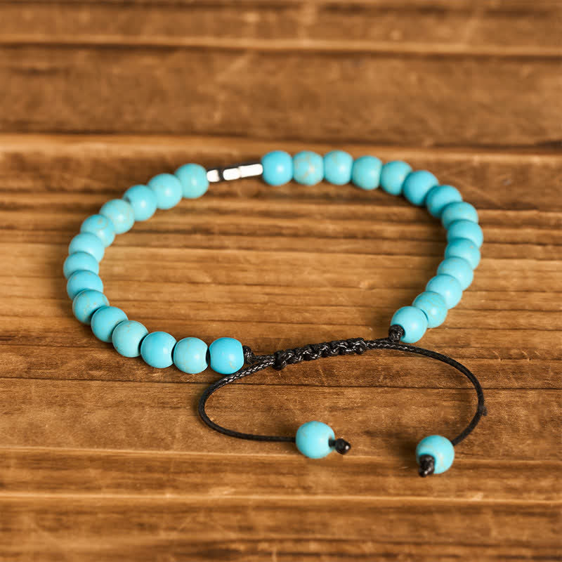 Bracciale regolabile con croce della fede e perline turchesi - image 6