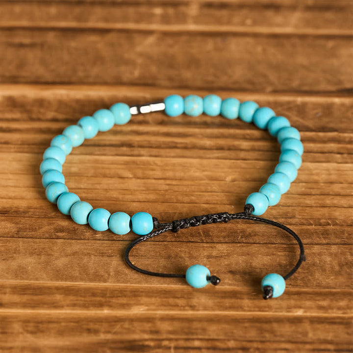 Bracciale regolabile con croce della fede e perline turchesi - image 6