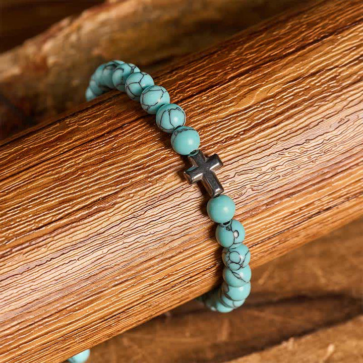 Bracciale regolabile con croce della fede e perline turchesi - image 1