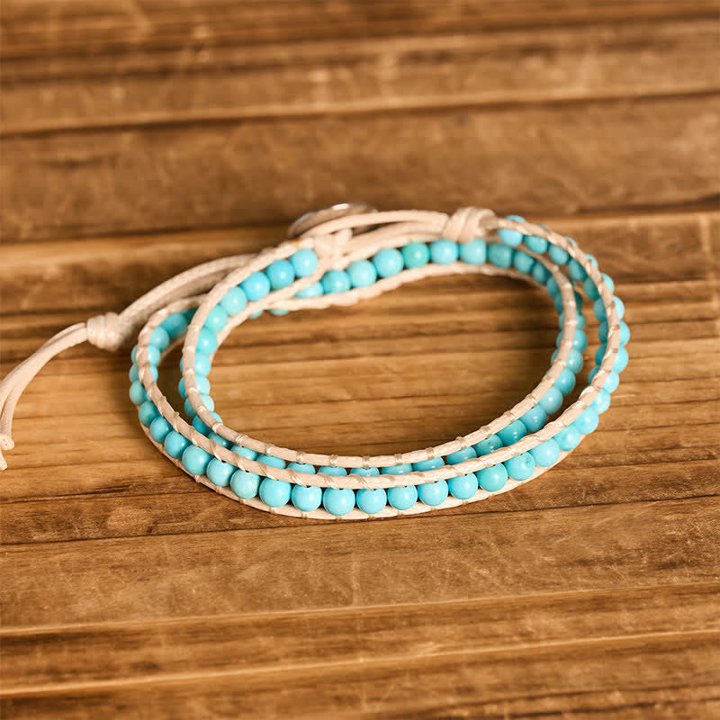 Bracciale a doppio giro pulito con perline turchesi e cordino beige - image 3