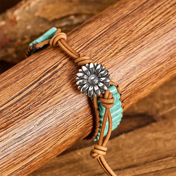 Bracciale in pelle con bottone di girasole e tubo turchese, ideale per trattamenti curativi. - image 5