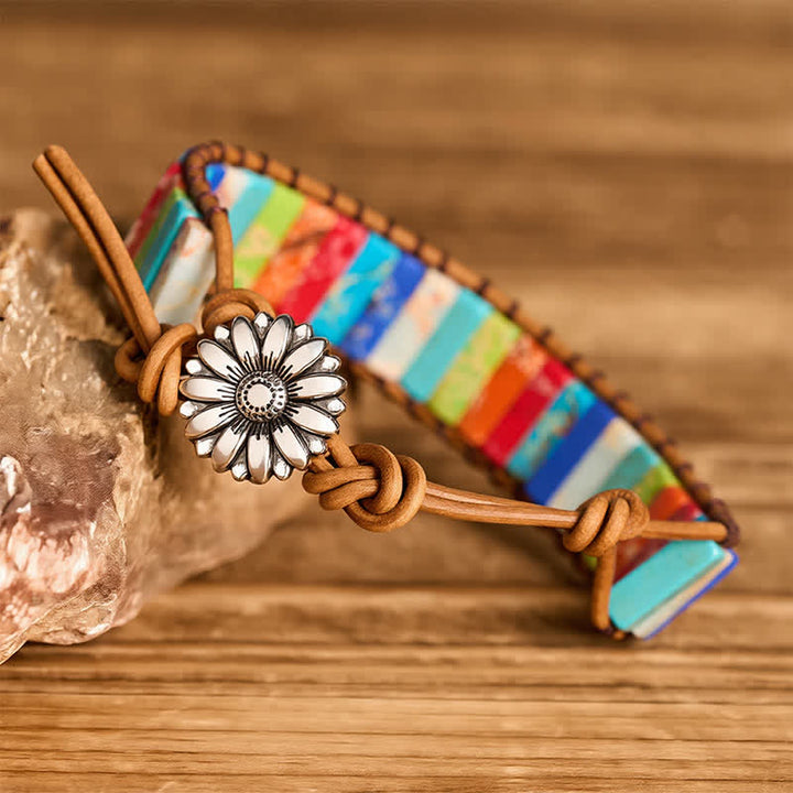 Bracciale in pelle con bottone di girasole e tubo turchese, ideale per trattamenti curativi. - image 2