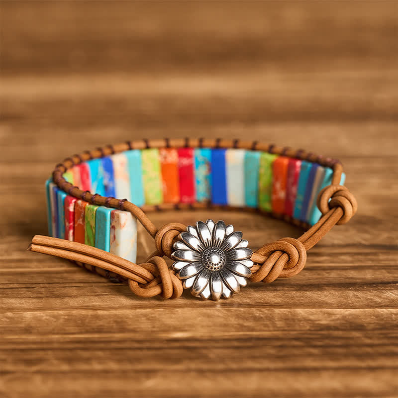 Bracciale in pelle con bottone di girasole e tubo turchese, ideale per trattamenti curativi. - Multicolore - image 0