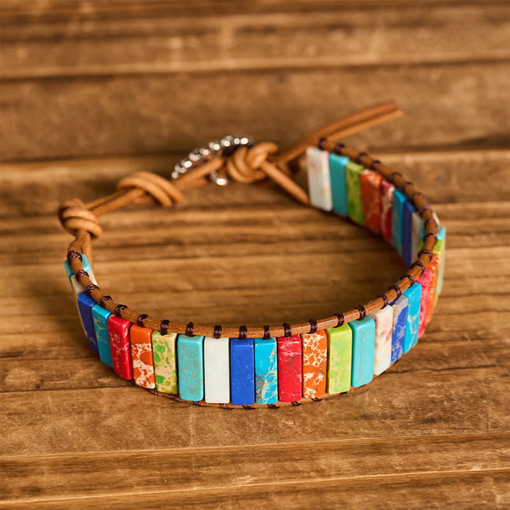 Bracciale in pelle con bottone di girasole e tubo turchese, ideale per trattamenti curativi. - image 3