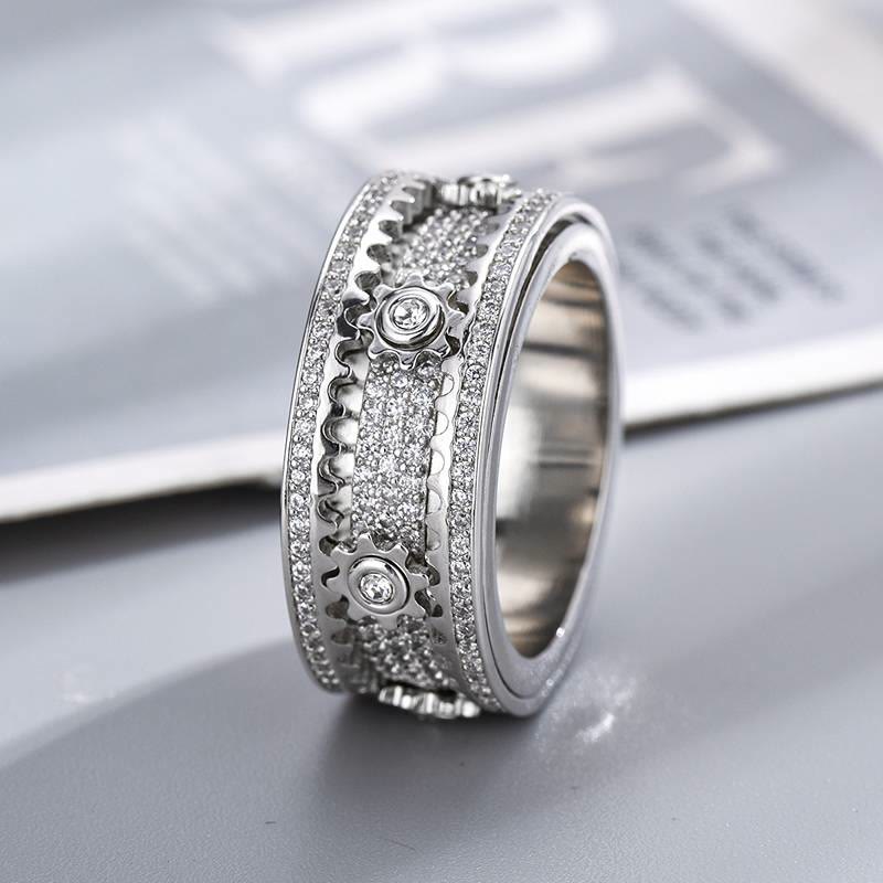 Anello girevole con zirconi e ingranaggio integrato, interamente tempestato di cristalli, ideale per gioielli da festa. - Argento - US 12 - image 0