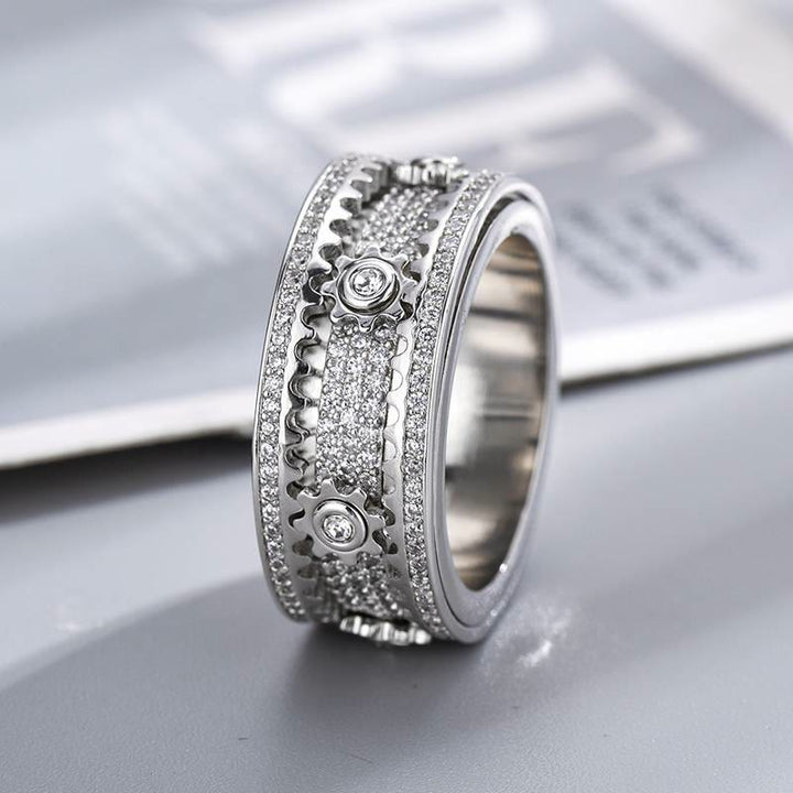Anello girevole con zirconi e ingranaggio integrato, interamente tempestato di cristalli, ideale per gioielli da festa. - Argento - US 12 - image 0