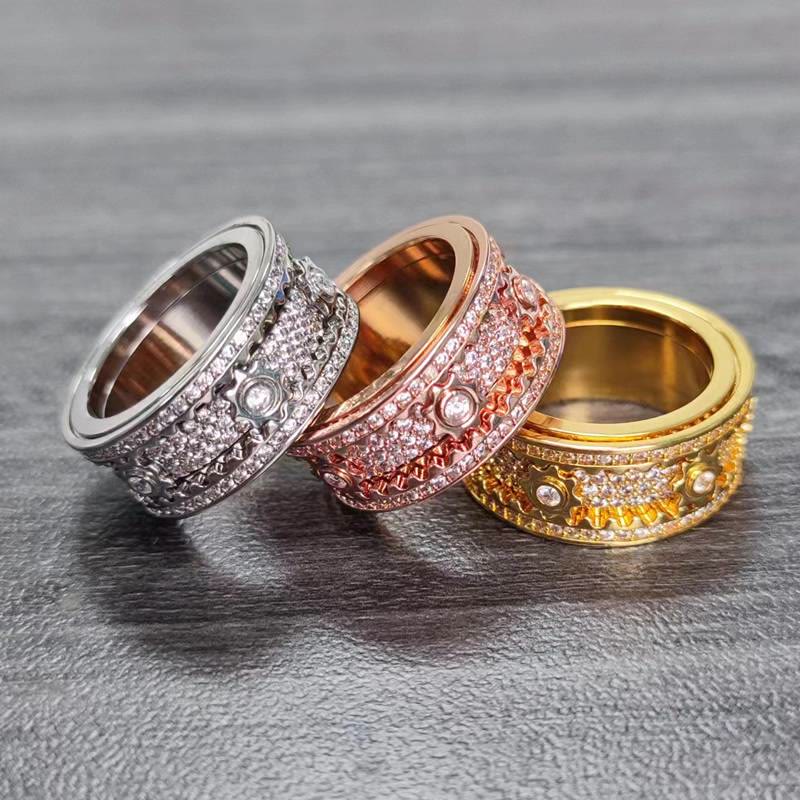 Anello girevole con zirconi e ingranaggio integrato, interamente tempestato di cristalli, ideale per gioielli da festa. - image 2