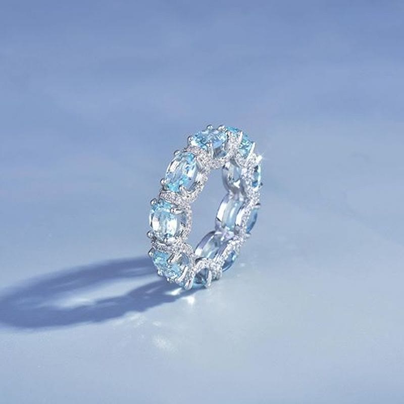 Anello a fascia eternity con cristalli azzurri e pavé di zirconi, anello impilabile da donna - US 10 - image 0