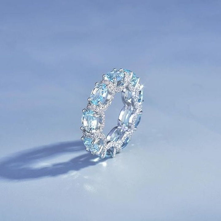 Anello a fascia eternity con cristalli azzurri e pavé di zirconi, anello impilabile da donna - US 10 - image 0