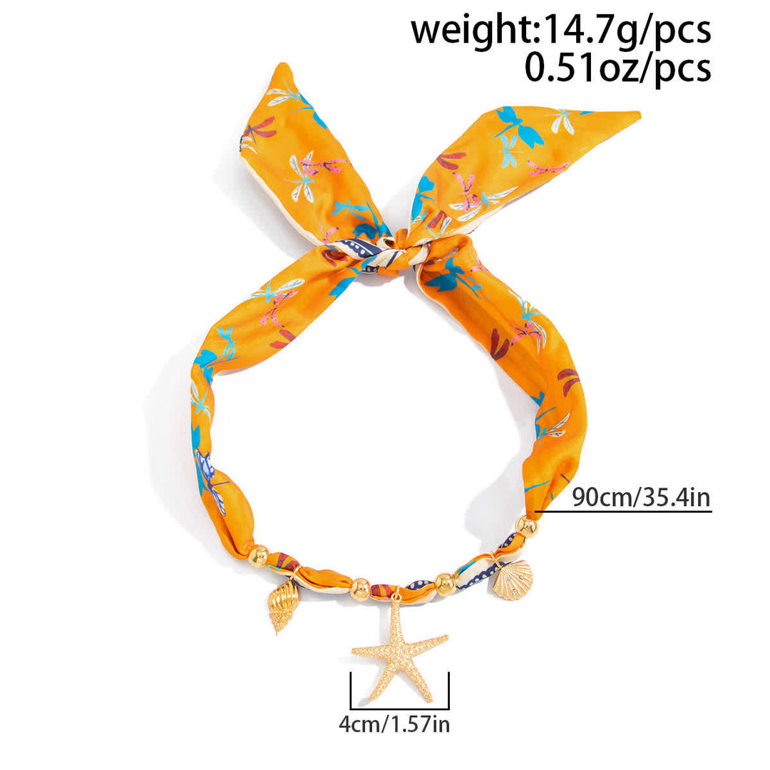 Collana con ciondolo a forma di stella marina arancione, conchiglia e libellula. - image 2