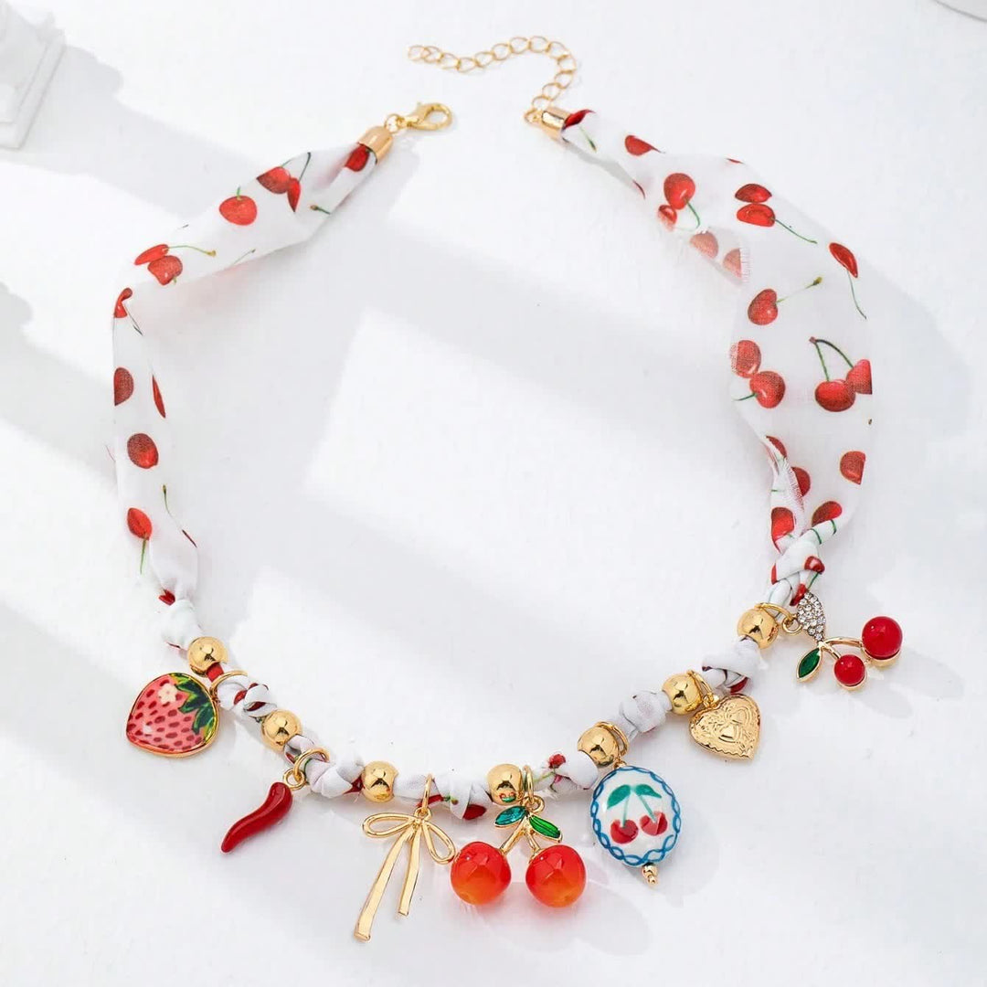 Collezione di sciarpe e collane con ciondoli a forma di frutta colorata - image 6