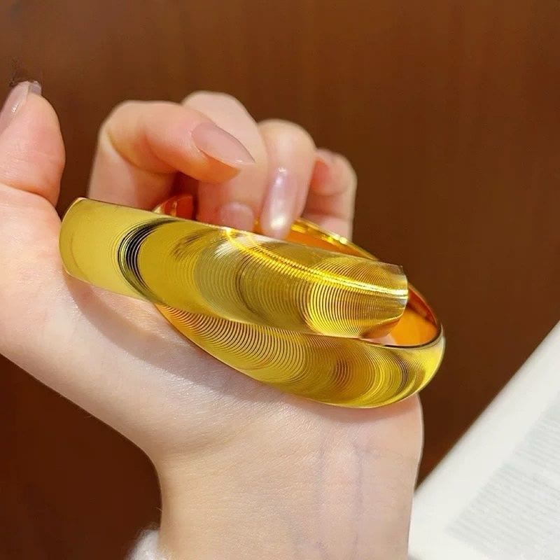 Bracciale rigido regolabile da donna con texture a occhio di gatto aperto e placcatura galvanica. - image 1