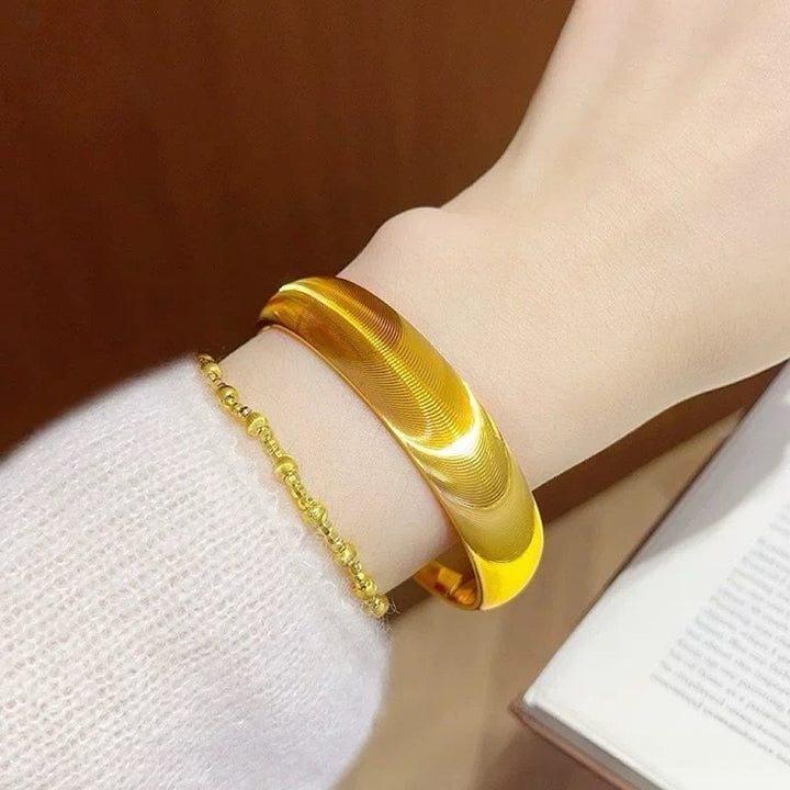 Bracciale rigido regolabile da donna con texture a occhio di gatto aperto e placcatura galvanica. - image 2