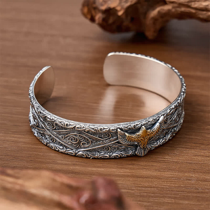 Bracciale a polsino aperto con aquila occidentale e incisioni a volute. - image 4