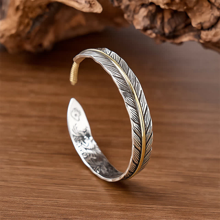 Bracciale a polsino aperto con totem a piuma singola Spirit bicolore. - Argento e bronzo - image 0