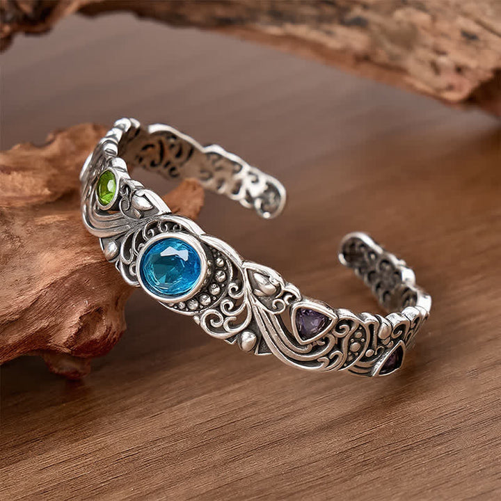 Bracciale a polsino aperto con pietre preziose decorate. - image 3