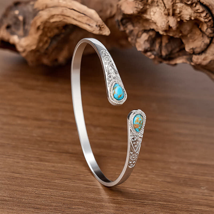 Bracciale aperto Rugged Beauty con due gocce di turchese. - Blu turchese - image 0