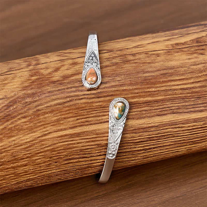 Bracciale aperto Rugged Beauty con due gocce di turchese. - image 9