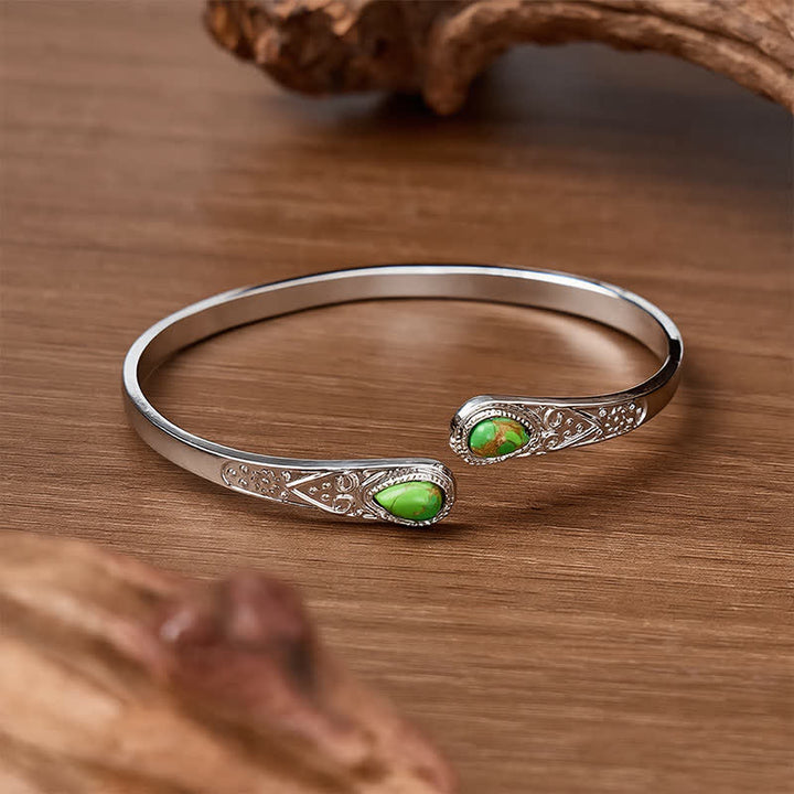 Bracciale aperto Rugged Beauty con due gocce di turchese. - image 7