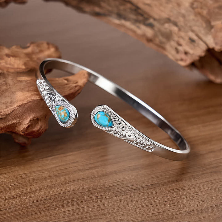 Bracciale aperto Rugged Beauty con due gocce di turchese. - image 2