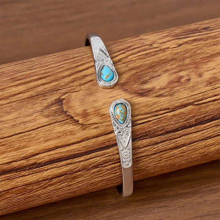 Bracciale aperto Rugged Beauty con due gocce di turchese. - image 1