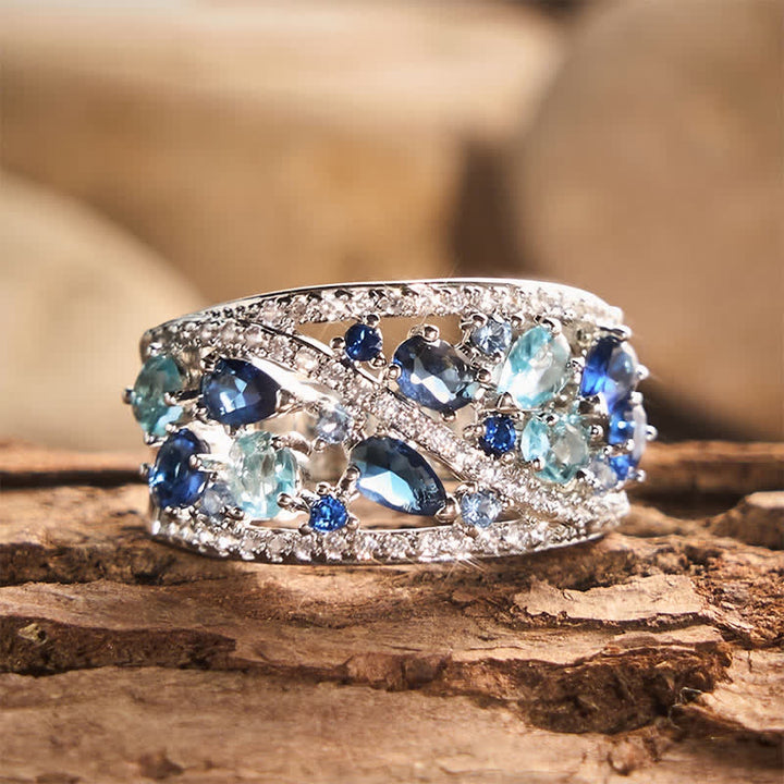 Anello da donna a fascia larga con pavé di zirconi e pietre multiple. - Blu oceano - US 10 - image 0