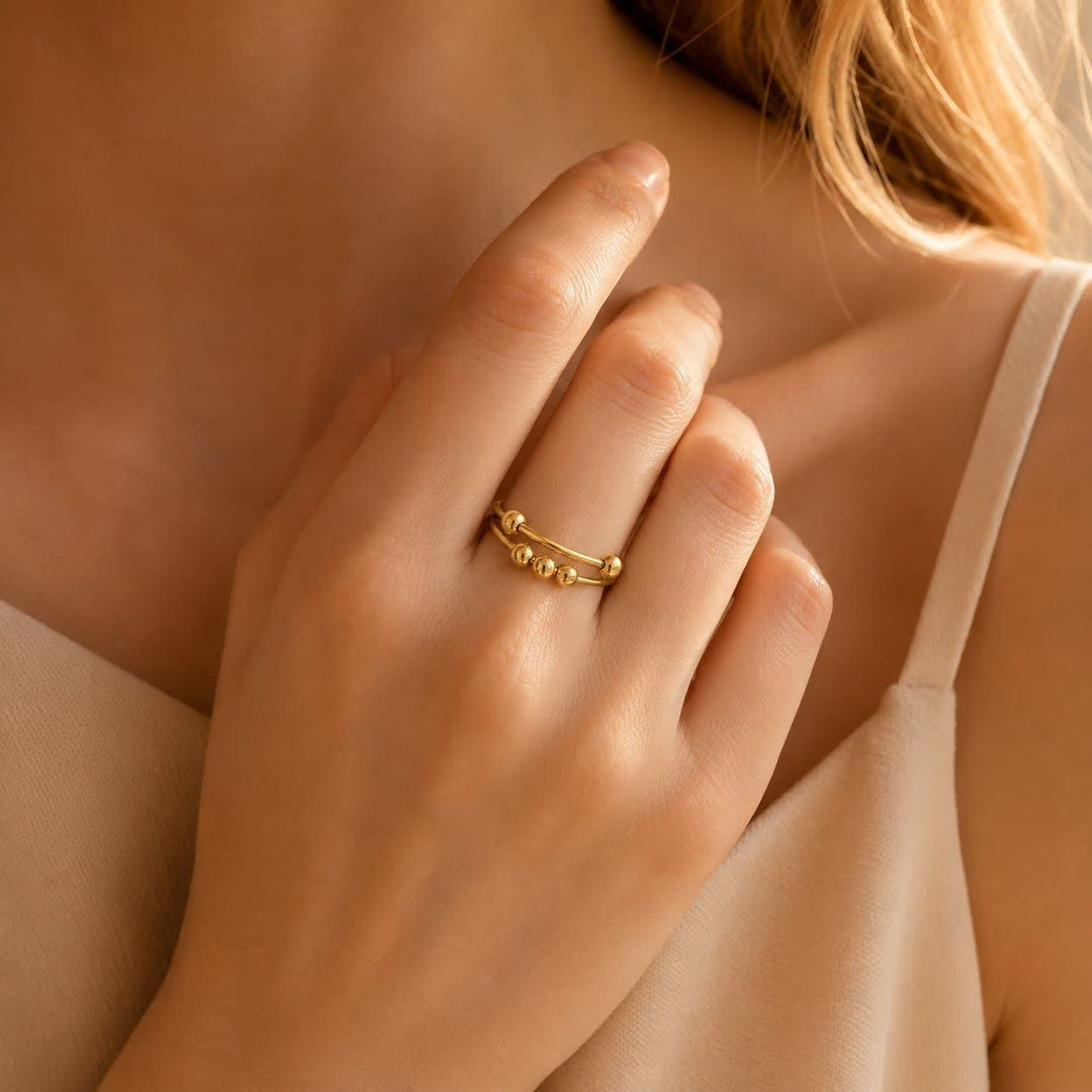 Simpatico anello antistress con perline scorrevoli per alleviare l'ansia. - Oro - image 0