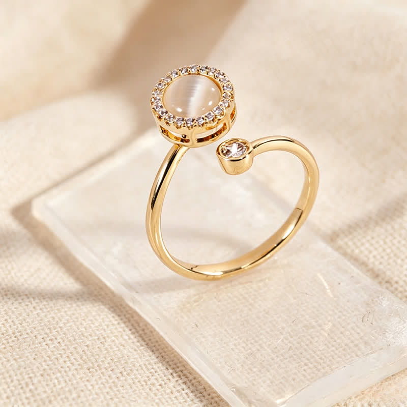 Anello antiansia regolabile con spinner a forma di occhio di gatto dorato - image 1