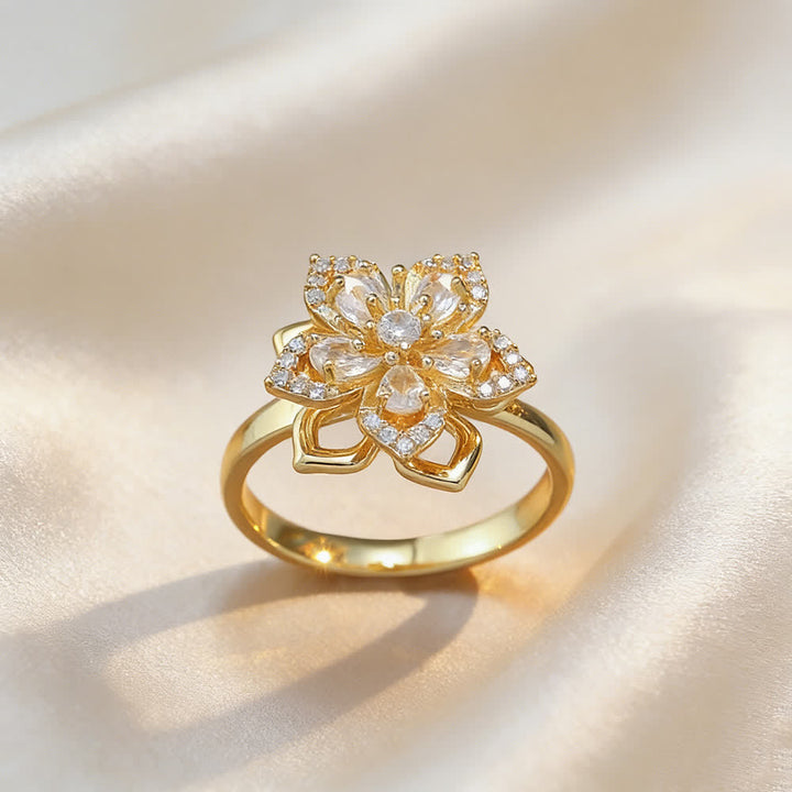 Anello antistress girevole con zirconi a forma di fiore di ciliegio - Bianco e oro - image 9
