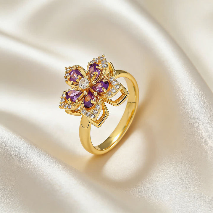 Anello antistress girevole con zirconi a forma di fiore di ciliegio - Viola e oro - image 5