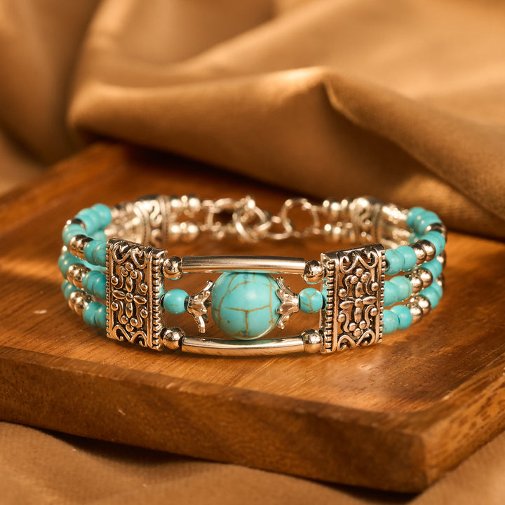 Bracciale Boho Cowgirl a triplo strato con perline turchesi - image 0