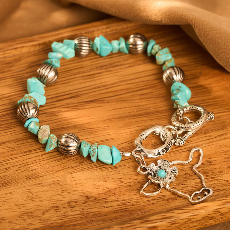 Bracciale vintage western con schegge di turchese, teschio di toro e fiori in argento antico e perline. - image 3
