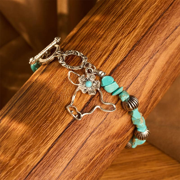 Bracciale vintage western con schegge di turchese, teschio di toro e fiori in argento antico e perline. - image 2