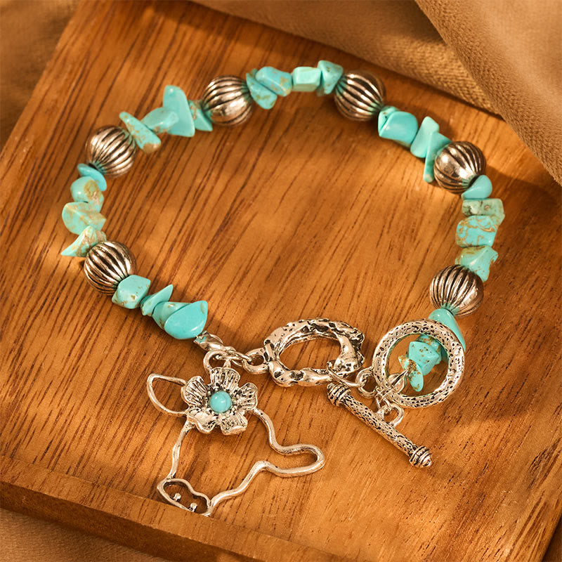 Bracciale vintage western con schegge di turchese, teschio di toro e fiori in argento antico e perline. - image 4