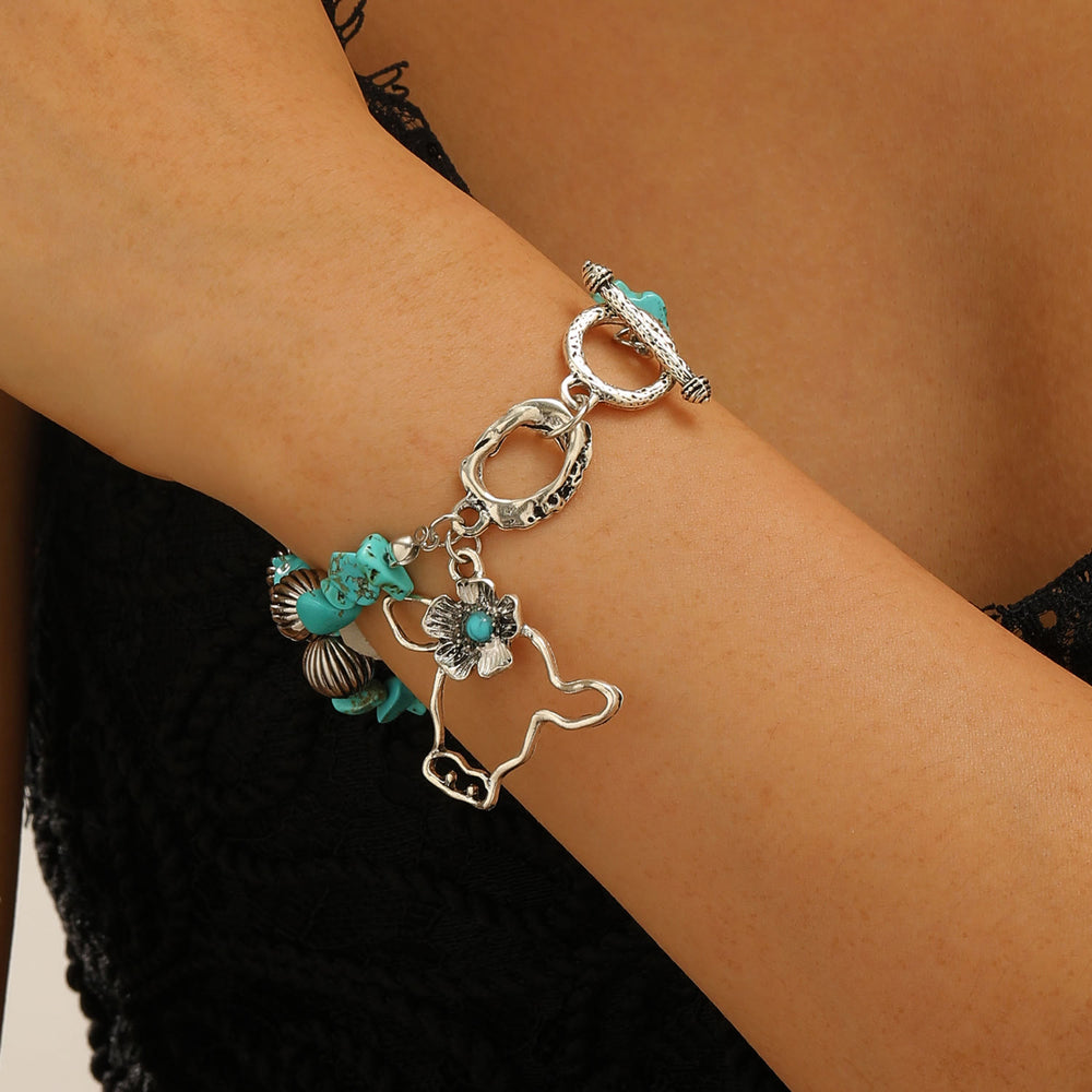 Bracciale vintage western con schegge di turchese, teschio di toro e fiori in argento antico e perline. - Verde - image 1