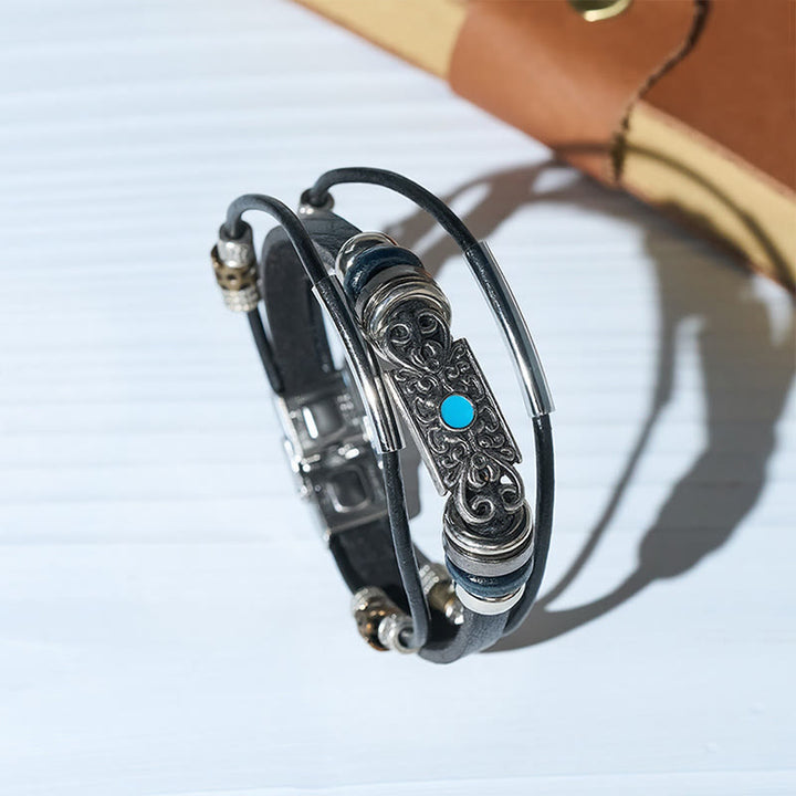 Bracciale da uomo vintage western in pelle con pietre blu e filigrana - image 0