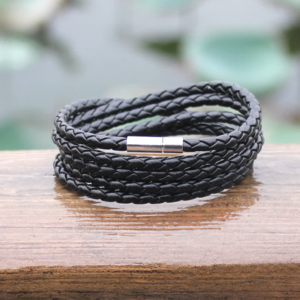 Bracciale avvolgente in pelle sintetica intrecciata con fibbia magnetica multistrato - image 1