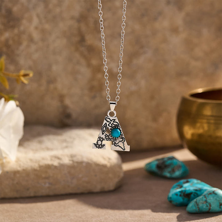 Collana vintage con ciondolo a forma di iniziale turchese - A - image 0