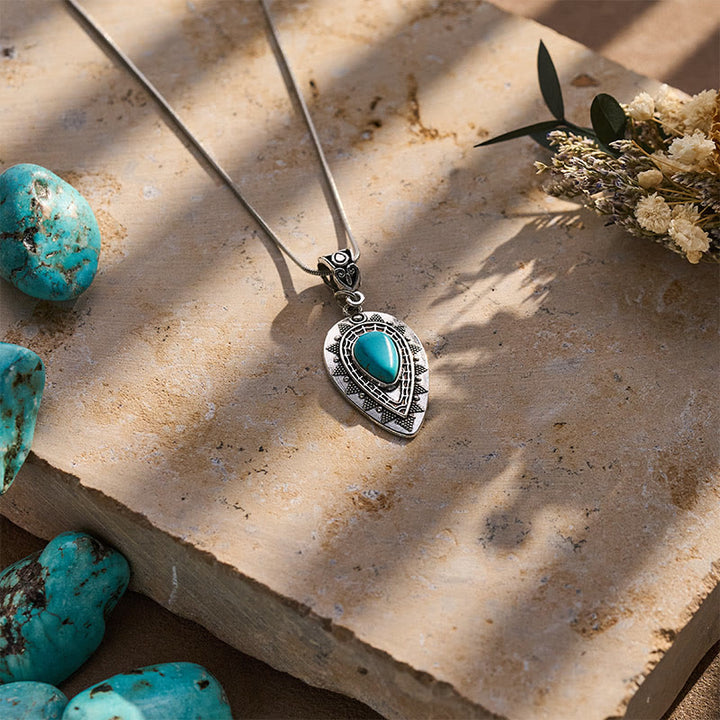 Collana vintage con pendente a goccia in turchese inciso. - image 4
