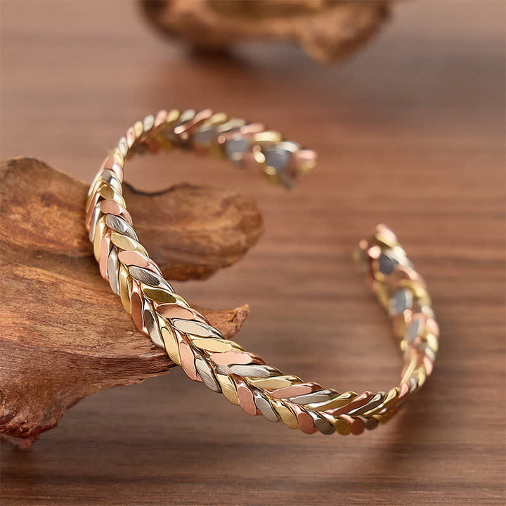 Bracciale rigido magnetico con apertura a polsino e treccia in rame tricolore. - image 2