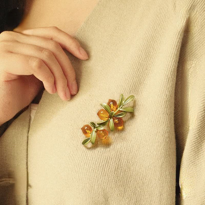 Spilla pastorale da donna con frutti di bosco arancioni