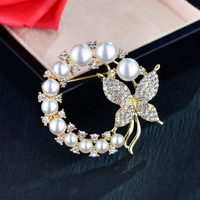 Spilla da donna con ghirlanda di perle e farfalla dorata