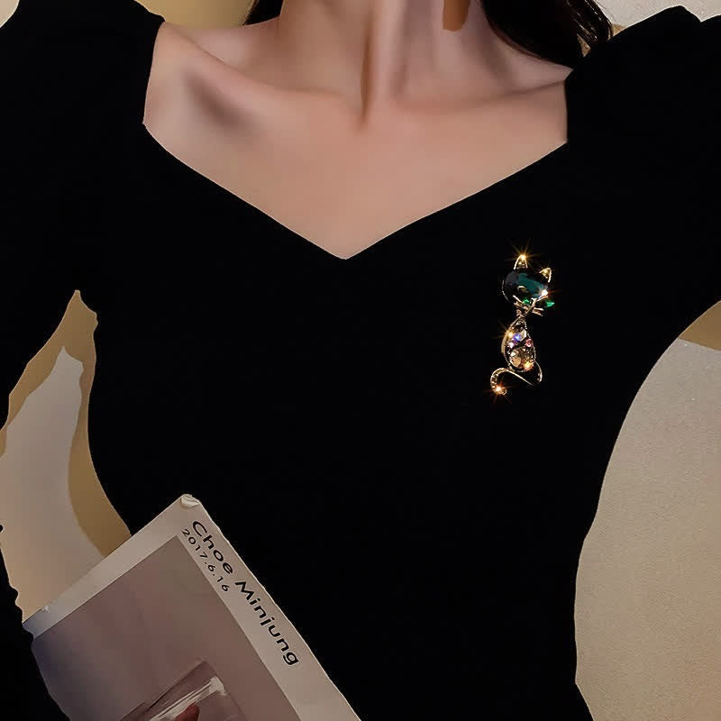 Spilla da donna con occhi di volpe color verde acqua